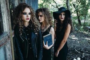 three vintage women as witches photo