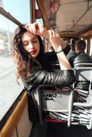 Woman traveling inside the tram photo