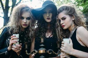 three vintage women as witches photo