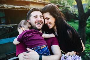 young family with a child on the nature photo