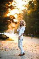 beautiful girl in sunset light photo