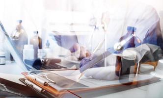 Medicine doctor and stethoscope touching icon medical network connection with modern interface on digital tablet in hospital background. Medical technology network concept photo