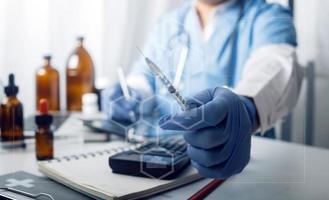 Medicine doctor and stethoscope touching icon medical network connection with modern interface on digital tablet in hospital background. Medical technology network concept photo