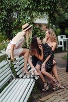 three girls on the bench photo