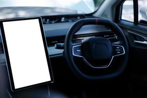 Monitor in EV car with isolated blank screen use for GPS. Isolated on white with clipping path. Car display with blank screen. Modern car interior details photo