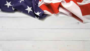 United states flag on white, weathered wooden clapboard background photo