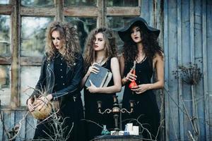 three vintage women as witches photo