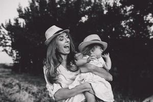 mother and daughter together outdoors photo