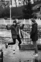 beautiful couple having fun on the pier photo