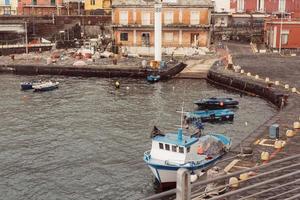 Berth with boats in the town photo