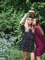 Two girls in a summer park photo