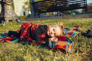 Smiling girl on the meadow photo