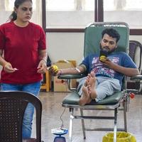 Delhi, India, June 19 2022 - Blood donor at Blood donation camp held at Balaji Temple, Vivek Vihar, Delhi, India, Image for World blood donor day on June 14 every year, Blood Donation Camp at Temple photo