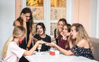 Six girls at the table photo