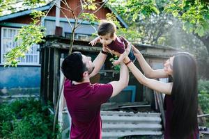 young family with a child on the nature photo