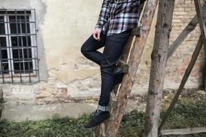 The man in the authentic boots and jeans selvedge photo