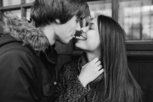 Beautiful young adult couple posing at camera photo