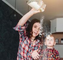 Mom and little son in the kitchen photo