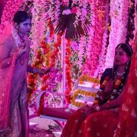 New Delhi, India - August 13, 2022 - Cute Indian dressed up as Lord Krishna and Radha on the occasion of Krishna Janmastami Festival in Delhi India, Radha Krishna performance on Janmashtami festival photo