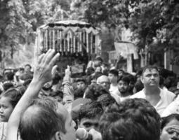 New Delhi, India July 01 2022 - A huge gathering of devotees from different parts of Delhi on the occasion of ratha yatra or rathyatra. Rath for Lord Jagannath pulled by people, Jagannath Rath Yatra photo