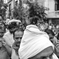 New Delhi, India July 01 2022 - A huge gathering of devotees from different parts of Delhi on the occasion of ratha yatra or rathyatra. Rath for Lord Jagannath pulled by people, Jagannath Rath Yatra photo