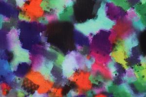 Detailed close up view on samples of cloth and fabrics in different colors found at a fabrics market photo