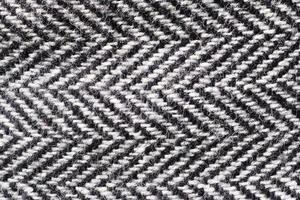 Detailed close up view on samples of cloth and fabrics in different colors found at a fabrics market photo
