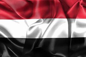 Ilustración 3d de una bandera de yemen - bandera de tela ondeante realista foto