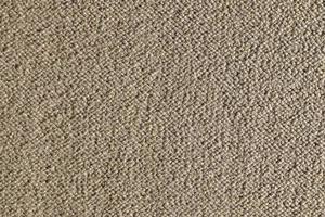 Detailed close up view on samples of cloth and fabrics in different colors found at a fabrics market photo