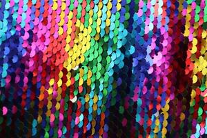 Detailed close up view on samples of cloth and fabrics in different colors found at a fabrics market photo