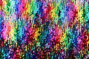 Detailed close up view on samples of cloth and fabrics in different colors found at a fabrics market photo