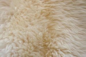 Detailed close up view on samples of cloth and fabrics in different colors found at a fabrics market photo