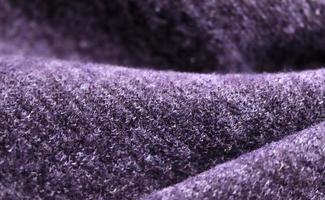 Detailed close up view on samples of cloth and fabrics in different colors found at a fabrics market photo