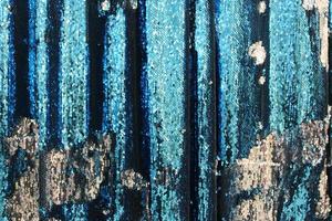 Detailed close up view on samples of cloth and fabrics in different colors found at a fabrics market photo