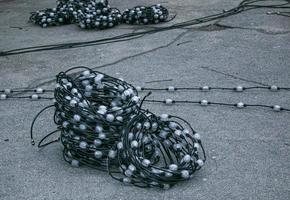 Municipal services are dismantling the city's Christmas tree after the holidays. Christmas lights are packed until next Christmas photo