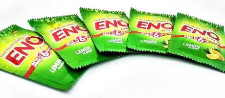 Assorted ENO products on white background. ENO is fast-acting effervescent fruit salts, used as an antacid and reliever of bloatedness by company GlaxoSmithKlin photo