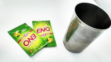 Assorted ENO products on white background. ENO is fast-acting effervescent fruit salts, used as an antacid and reliever of bloatedness by company GlaxoSmithKlin photo