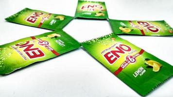 Assorted ENO products on white background. ENO is fast-acting effervescent fruit salts, used as an antacid and reliever of bloatedness by company GlaxoSmithKlin photo
