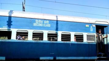 Indian railways express train standing still at platform ready to depart selective focus photo