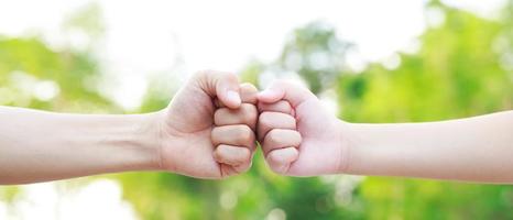 Children's hands with the warmth of mother's care photo