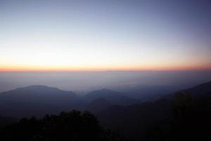 Beautiful view of mountains and white mist photo