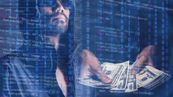 The concept of hackers and insecurity in networking. Dishonest hood man or data thieves photo