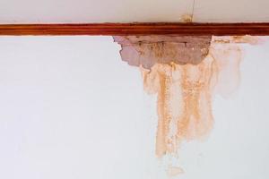 Water damaged ceiling roof, brown stain, office building photo