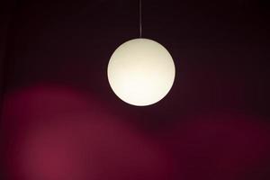 Lamp in the shape of a ball. Lighting design. photo