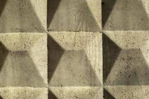 Text of concrete block. Industrial fence in the Soviet Union. Background from a concrete fence. Grey wall. photo