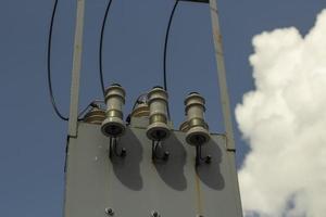 Pole with electricity. Lots of high-current wires. photo