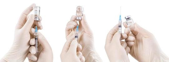 Hand holding syringe with vaccine against corona virus. photo