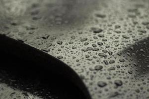 Parts of a wet car. Drops on the surface of the machine. photo