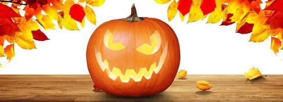 Scary Halloween pumpkin with eyes glowing inside on wooden background photo