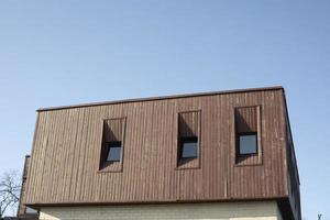 Roof of country house. Building in rural town. photo